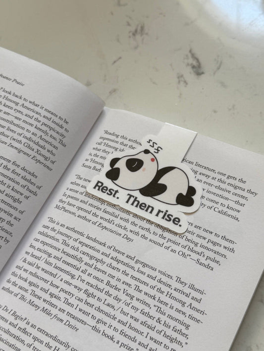 magnetic bookmark of a panda on a book