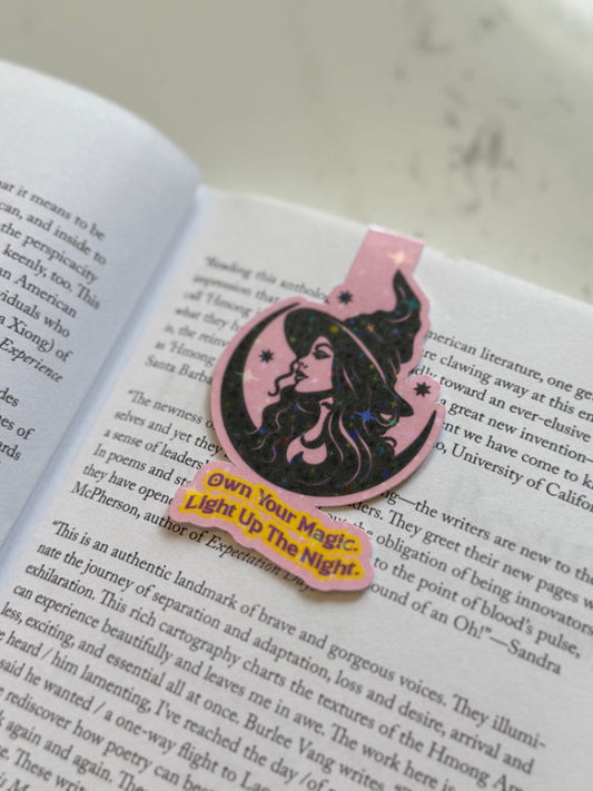 Starbucks-themed bookmark with a pink border and black illustration on an open book.