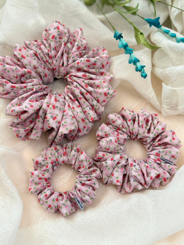 picture of three different sizes of cherry blossom scrunchies