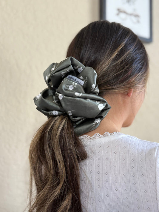Dark olive green with white flowers, designed for thick and long hair, offering a secure and stylish hold.
