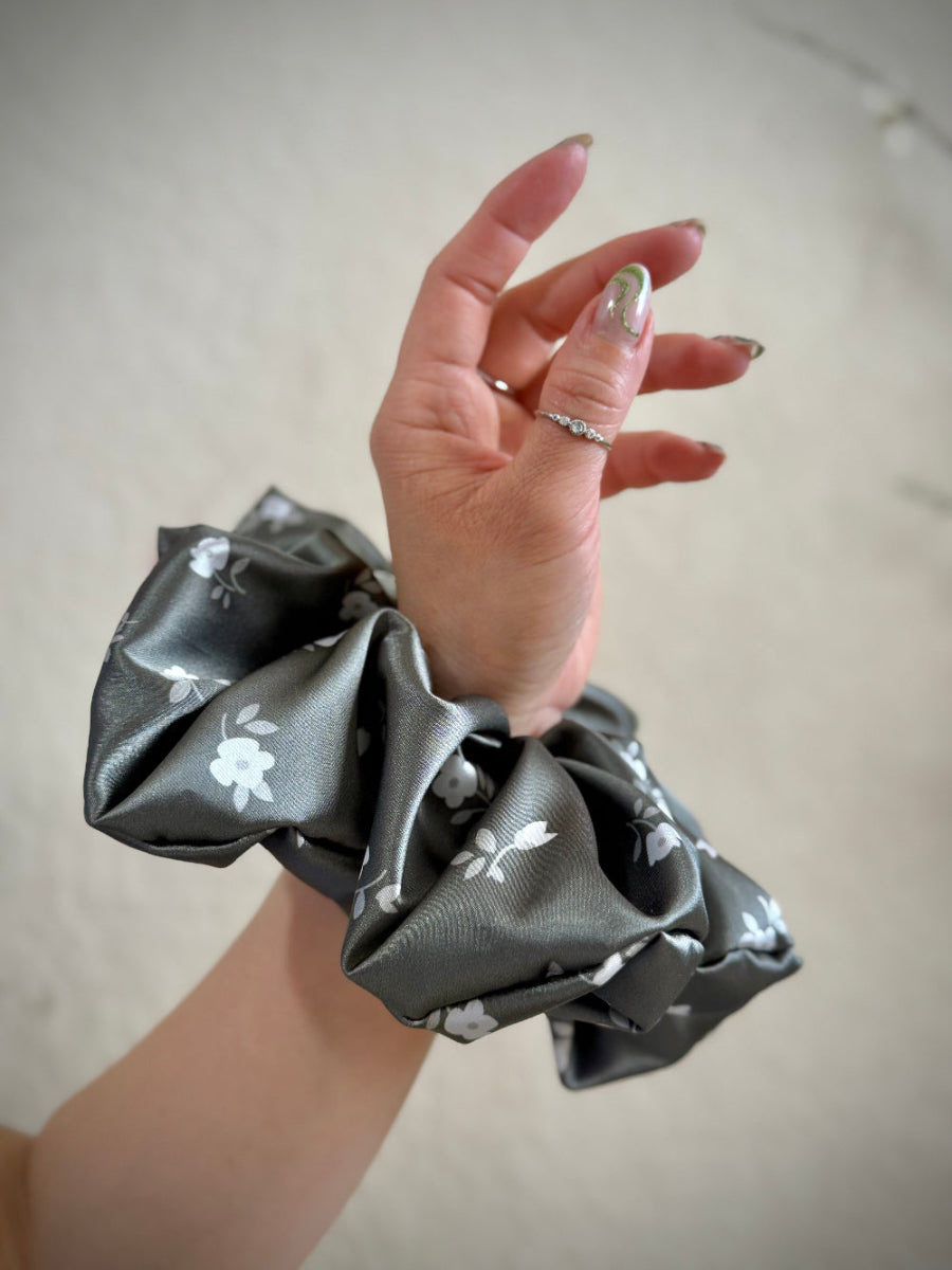 Dark olive green with white flowers, designed for thick and long hair, offering a secure and stylish hold.
