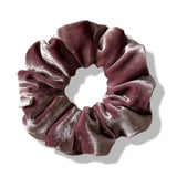 Mauve scrunchie on a white background