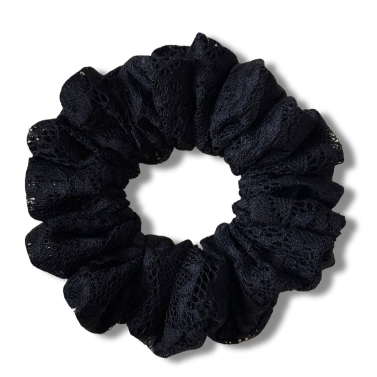 Black scrunchie on a white background
