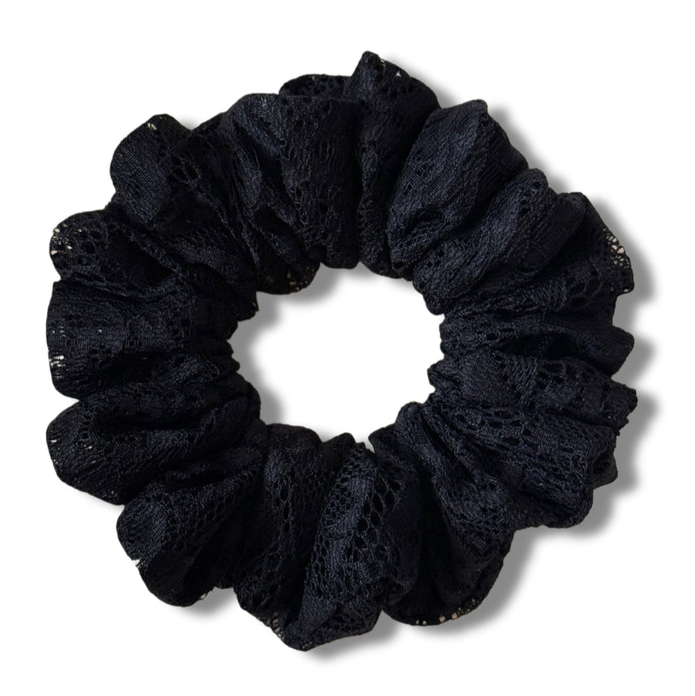 Black scrunchie on a white background