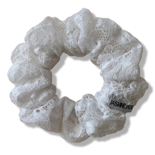 White lace scrunchie on a white background