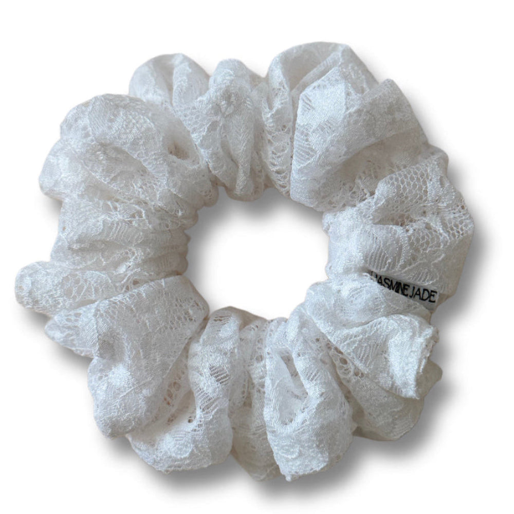 White lace scrunchie on a white background