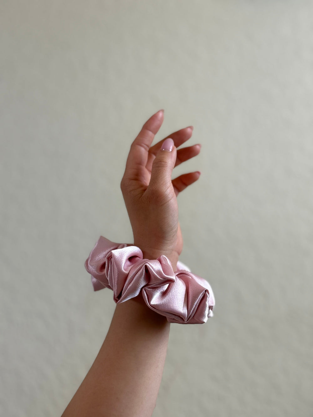 Amanda mini satin scrunchie in blush pink, designed for short or fine hair, offering a soft, crease-free, and elegant hold.
