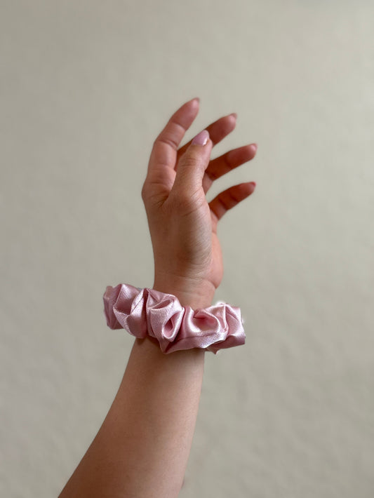 blush XS satin scrunchie in blush pink, designed for fine or short hair, offering a gentle, crease-free hold and soft elegant look.